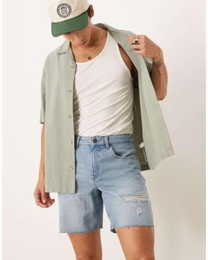ASOS Smalle Halflange Denim Short Met Scheuren En Wassing - Blauw