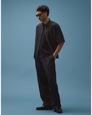 Bershka Fluid Super baggy Darted Trousers - Blue