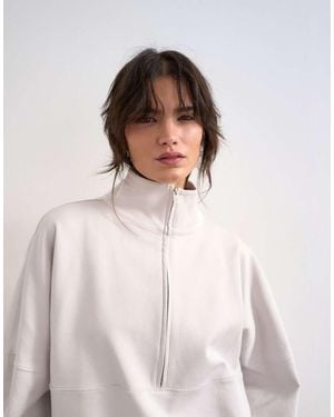 TOPSHOP Felpa Color Pietra A Maniche Lunghe Con Collo A Imbuto E Zip - Bianco