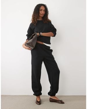 ASOS Asos Design Tall Cuffed Brushback sweatpants - Black