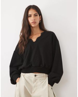 ASOS Sweatshirt mit spitzenbesatz und v-ausschnitt - Schwarz