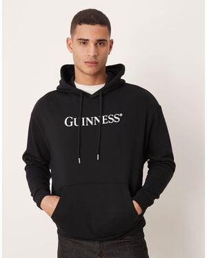 ASOS Relaxed Hoodie With Guinness Print - Black