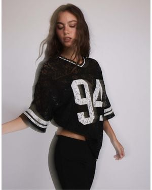 Stradivarius T-shirt mit nummer und spitze - Schwarz
