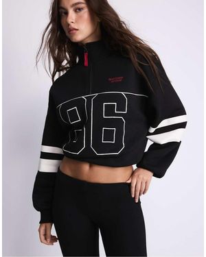 Stradivarius Sweatshirt Met Graphic En Ballonmouwen - Zwart