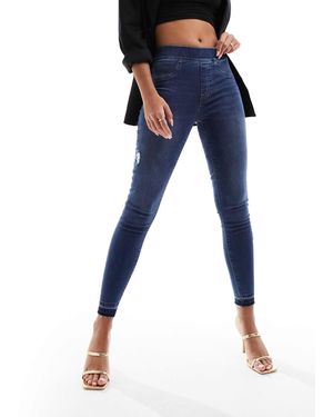 Spanx Shape and lift - jean skinny effet usé - moyen délavé - Bleu