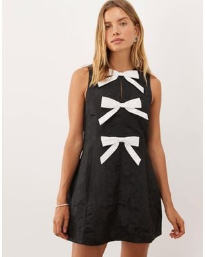 Sister Jane Nova kleid mit rundhalsausschnitt, ohne ärmel, schleifen-applikation, mini, - Schwarz