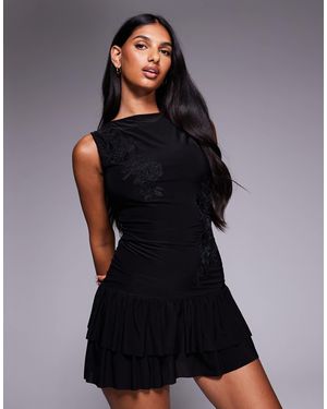 Fashionkilla Double-sculpted Slinky Slash Neck Low Back Ruffle Hem Flower Applique Mini Dress - Black
