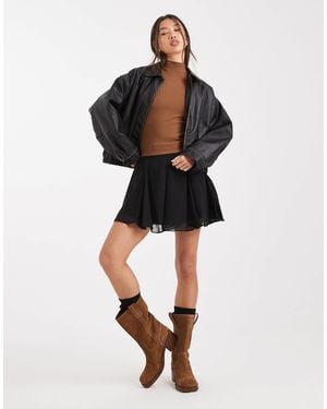 ASOS – schwingender minirock aus chiffon - Schwarz
