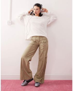 Collusion Pantalon cargo à taille basse et chevrons - Rose
