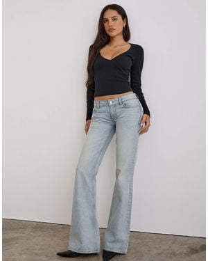 Motel Extra Low Rise Flare Jeans - White