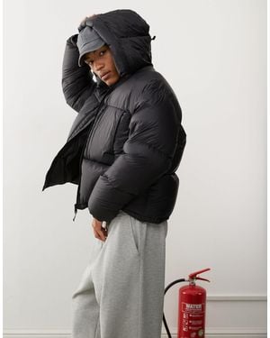 Weekday Doudoune à capuche avec poches zippées - Noir