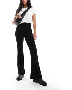 ASOS Pantalones Negros De Campana Con Abertura En El Bajo De Canalé Otomano De