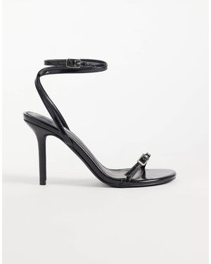Raid Sandales à talons à brides aneza es - Blanc