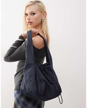 Monki Nylon Shoulder Bag With toggle Detail - Blue