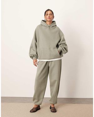 ARRANGE Joggers Con Bajos Ajustados De Tejido Grueso Premium De - Neutro