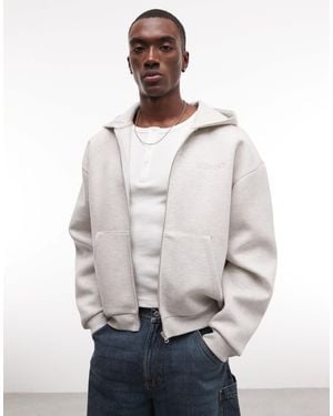 ASOS Sweat à capuche zippé coupe carrée oversize en tissu effet néoprène avec broderie ton sur ton - glacé chiné - Neutre