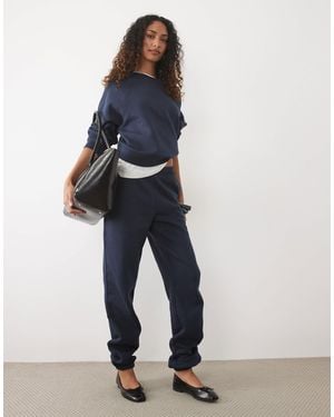 ASOS Asos Design Tall Cuffed Brushback sweatpants - Blue