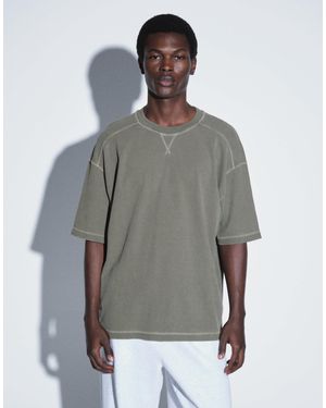 ASOS T-shirt oversize en foncé délavé à effet gaufré - Gris