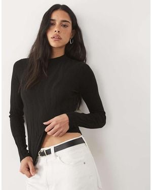 Mango Top Lavorato A Maglia Con Collo Alto E Stampa Animalier - Nero