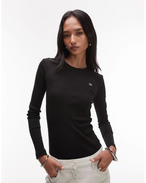 Lacoste – geripptes, langärmliges shirt - Schwarz