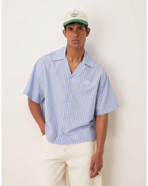 ASOS Chemise oversize coupe carrée à revers avec broderie - et blanc rayé - Bleu