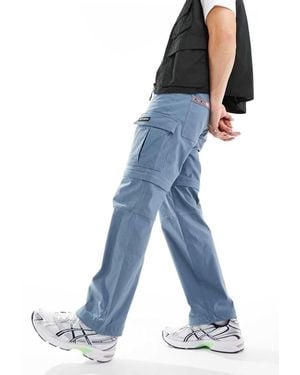 Berghaus Pantalones Cargo Azules Con Perneras Desmontables Con Cremallera Dolpa De Dean Street