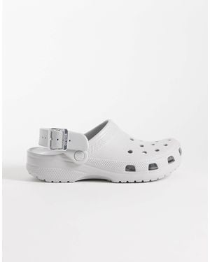 Crocs™ Classic Metallic Buckle Clogs - White