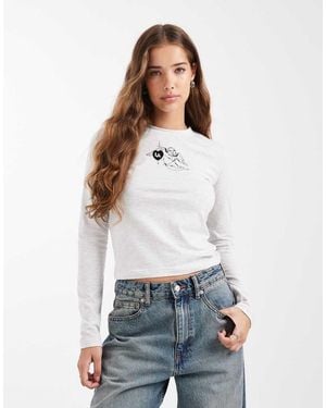 Daisy Street Long Sleeve Baby Tee With Angel Graphic - White