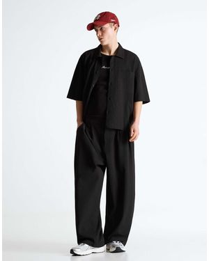 Bershka – plissierte, superweite hose im jogging-look - Schwarz