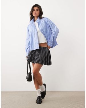 GOOD AMERICAN Low Rise Elasticated Waist Bow Detail Pleated Mini Skirt - Blue