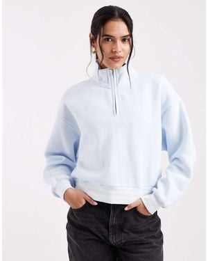 Levi's Sudadera Con Cuello De Cremallera Corta En Azul Claro - Blanco
