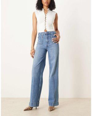 ASOS Asos Design Tall High Waist Wide Leg Jeans With Front Pockets In Mid Blue