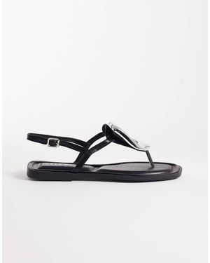 SEQWL Sandalias Negras Planas Con Adornos Plateados - Negro