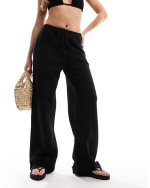 Iisla & Bird Fijngebreide Lange Strandbroek Met Smalle Taille - Zwart