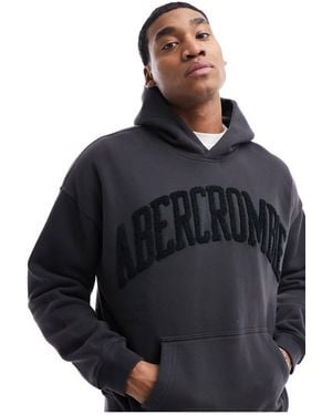 Abercrombie & Fitch Tonal Varsity Logo Oversized Hoodie - Black