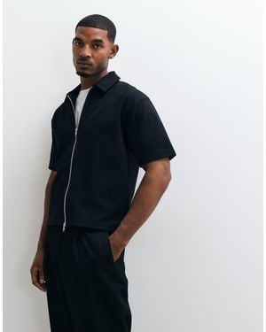 ASOS Polo Interlock Relaxed Squadrata Con Zip - Blu