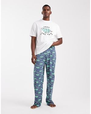 ASOS Christmas Pyjama Set With Dinosaur Graphic - Blue