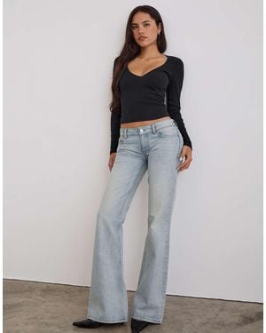 Motel Extra Low Rise Flare Jeans - White