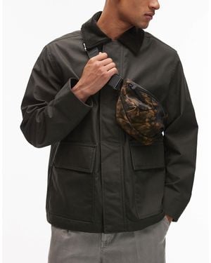 Rains 13180 valera - petit sac banane imperméable à imprimé boue - marron - Noir