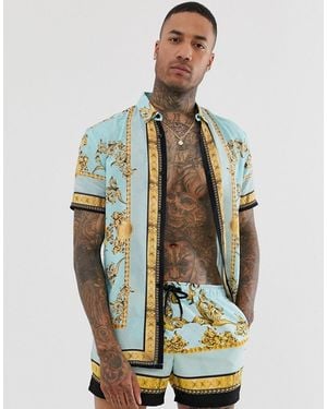 SIKSILK Camisa de manga corta con estampado azul y dorado de (parte