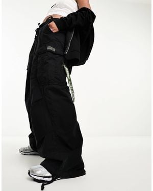 Superdry – weite fallschirmhose - Schwarz
