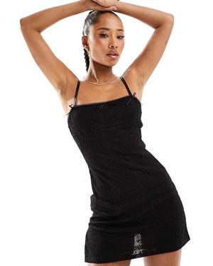 Lioness Vestito Corto A Canottiera Con Fiocco E Spacco Laterale - Nero