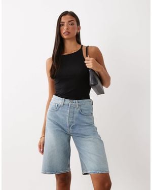 ARKET Short en jean coupe ample délavé clair - Bleu