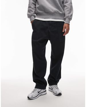 CAT WWR Cat - wwr - pantalon ample en sergé à boucle - Noir