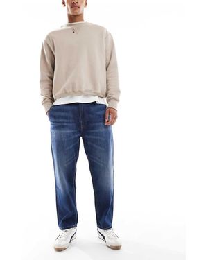 Calvin Klein Jeans Affusolati Stile Anni '90 Lavaggio Scuro - Blu
