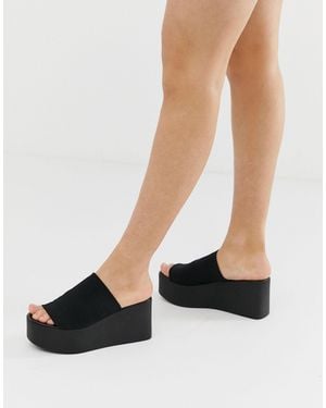 Steve Madden Sandalias con plataforma plana en negro Kareena