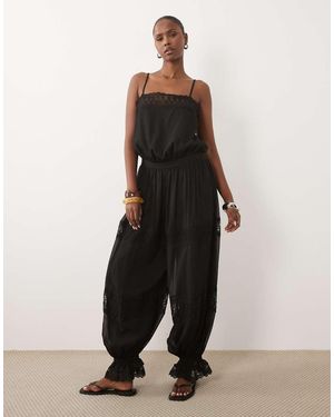 ASOS Doorschijnende Kanten Jumpsuit Met Bubbelzoom - Zwart