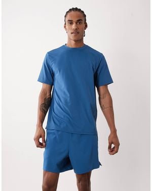 4505 5" Training Short With Towel Loop And Zip Pockets - Blue