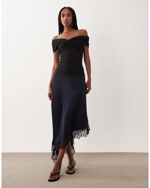 Vila Mini-jupe asymétrique en satin avec bordure en dentelle - Bleu
