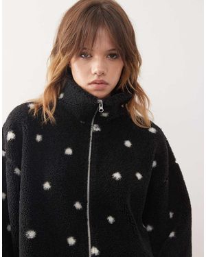 Monki Polar Negro Con Estampado De Lunares Blancos Y Cremallera De
